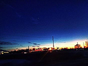 View of illuminated city at dusk