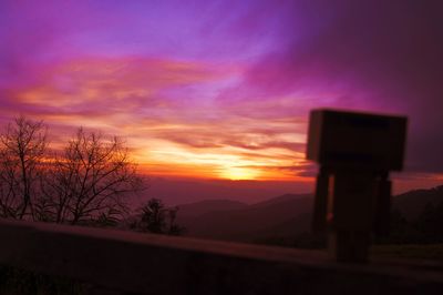 Scenic view of landscape against cloudy sky