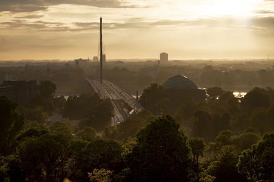 High angle view of trees and buildings against sky