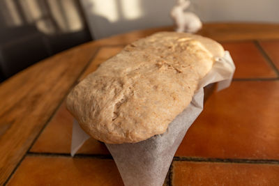 High angle view of bread on cutting board