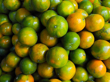 Full frame shot of oranges in market