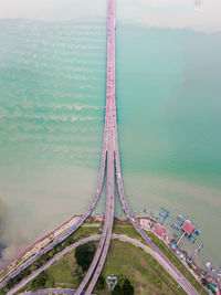 High angle view of bridge by road against sky
