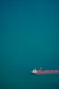 High angle view of sailboat in sea