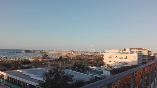 High angle view of buildings against clear sky