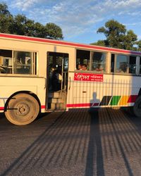 Bus on road against sky