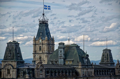 View of building against cloudy sky