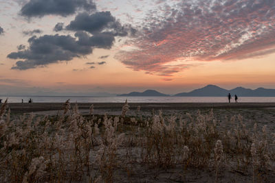 Scenic view of sea against sky at sunset