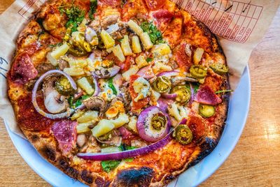 High angle view of pizza in plate on table