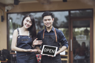 Portrait of a smiling young couple