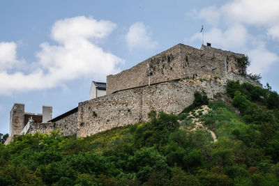 Low angle view of fort against sky