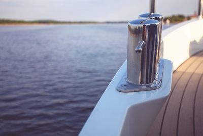 Close-up of boat against lake