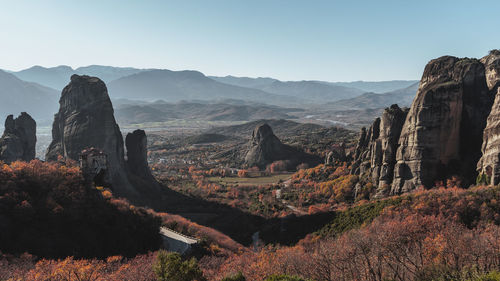 Panoramic view of landscape with mountain range in background