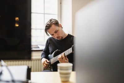 Man playing electric guitar