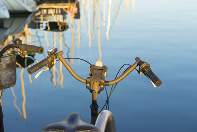 High angle view of bicycles parked by lake