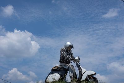 Low angle view of statue against blue sky