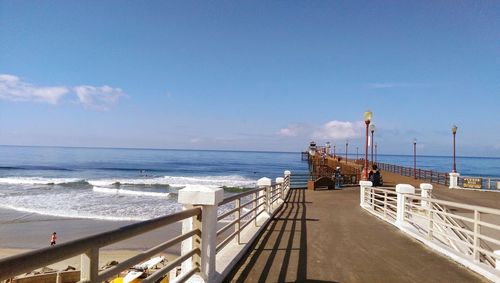 Pier on sea against sky