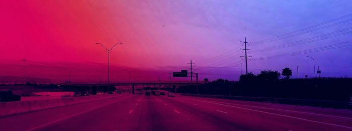 Road against sky at night