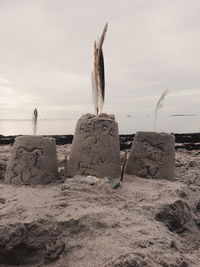 Sand castle on shore