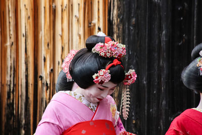 Close-up of woman with umbrella