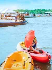 Man floating on sea