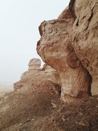 Rock formation against clear sky