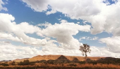 View of landscape against cloudy sky