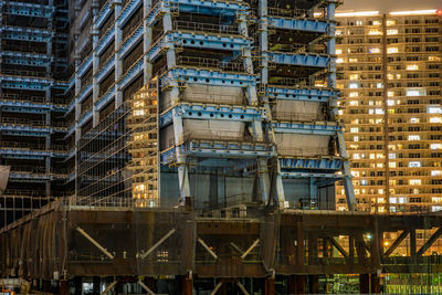 Low angle view of illuminated building at night