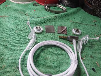 High angle view of various buttons on table