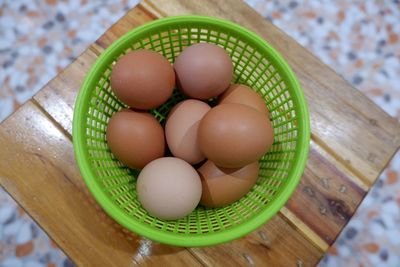 High angle view of eggs in container on table