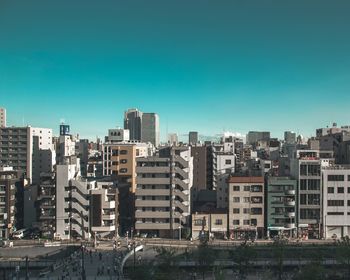 Cityscape against clear sky