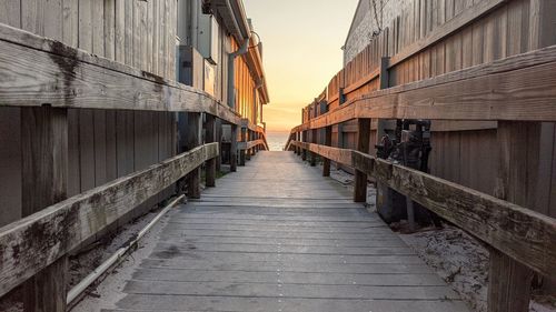 Wooden beach access between buildings