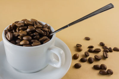 Close-up of coffee cup on table