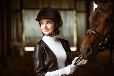 Portrait of teenage girl wearing hat