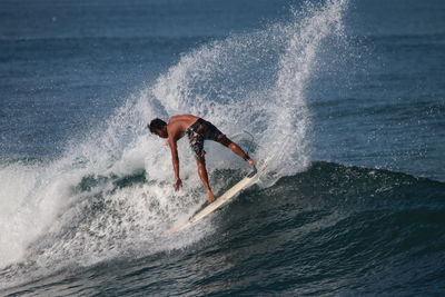 Man surfing in sea