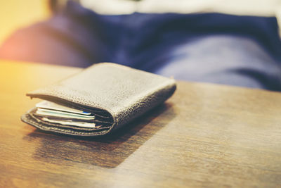 Close-up of wallet on table