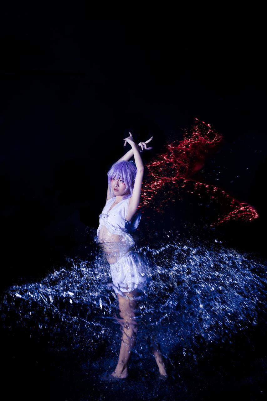 one person, night, real people, full length, water, black background, motion, standing, young adult, happiness, outdoors, childhood, beautiful woman, young women, one young woman only, human hand, people