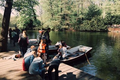 People relaxing in lake