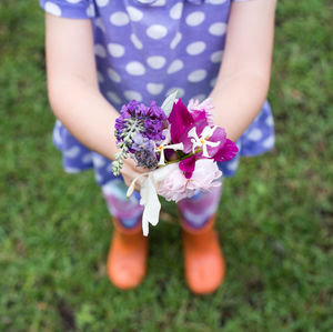 Close-up of hand on flower