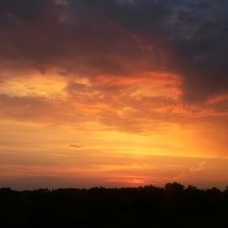 Scenic view of landscape at sunset