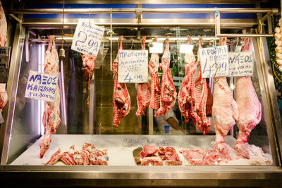 Meat hanging in butcher shop