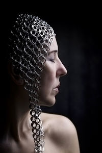 Portrait of woman with metal cap iii