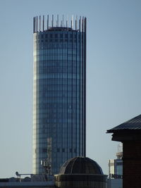 Low angle view of modern building against clear sky