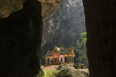 Rock formations in temple seen from cave