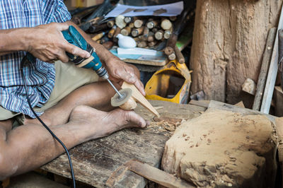 Man working on wood