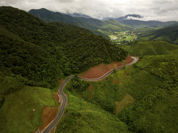 High angle view of road amidst mountains