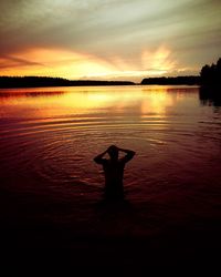 Scenic view of sunset over river