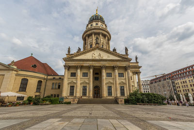 View of historic building against cloudy sky