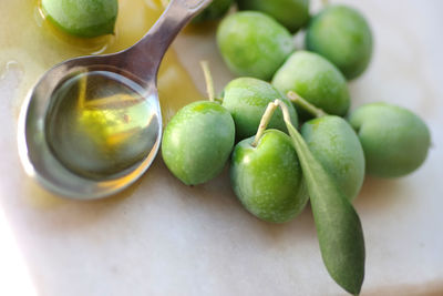 High angle view of grapes in bowl on table