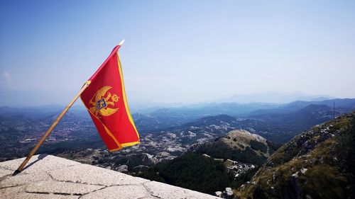 View of the montenegro flag at the njegos mausoleum, lovcen