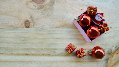 High angle view of red rose on table